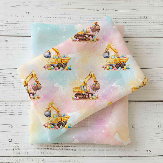 Jersey Osterstoff für Kinder mit Bagger und Ostereier. auf einem Regenbogen farbigen Hintergrund