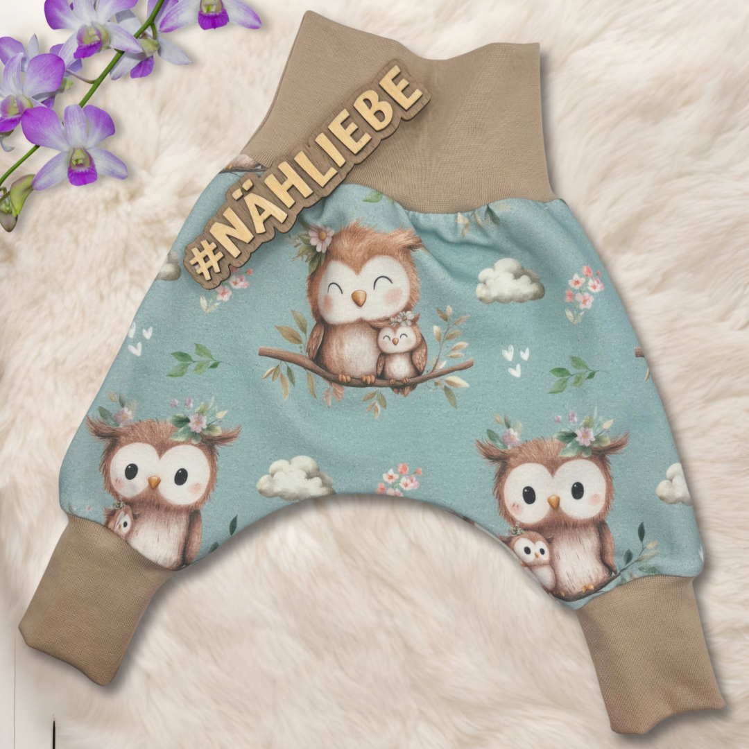 Eulen Stoff Meterware mint Detailaufnahme – Kinderstoff Jersey Nähprojekt