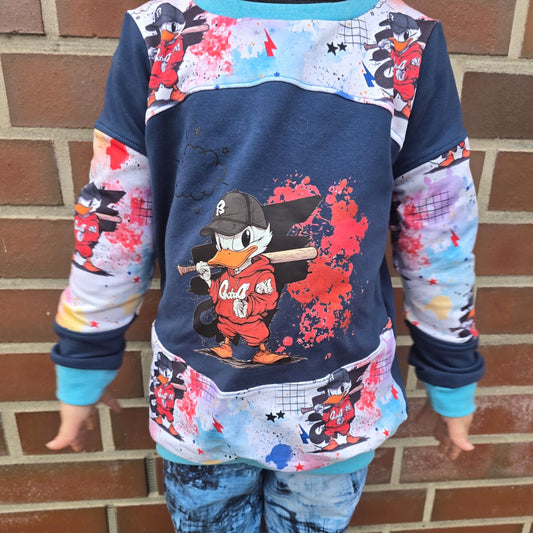 Baseball Ente Stoff Meterware Detailaufnahme – Kinderstoff Ente Motiv Jersey