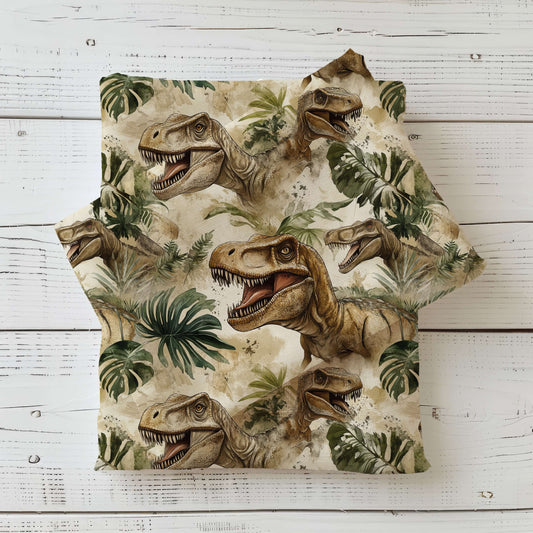 Realistischer Dino Stoff mit Tyrannosaurus und Dschungelblättern auf Jersey, Rib Jersey und French Terry – hochwertiger Kinderstoff als Meterware zum Nähen
