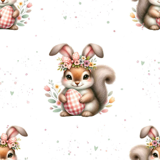 Detailaufnahme vom Jersey oder French Terry Stoff mit Osterhörnchen und floralen Details auf hellem Hintergrund, perfekt für kreative Nähprojekte